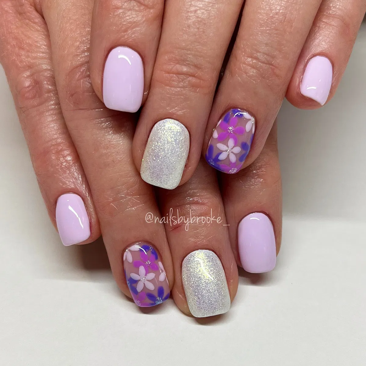 Pale lavender with silver glitter and floral accents