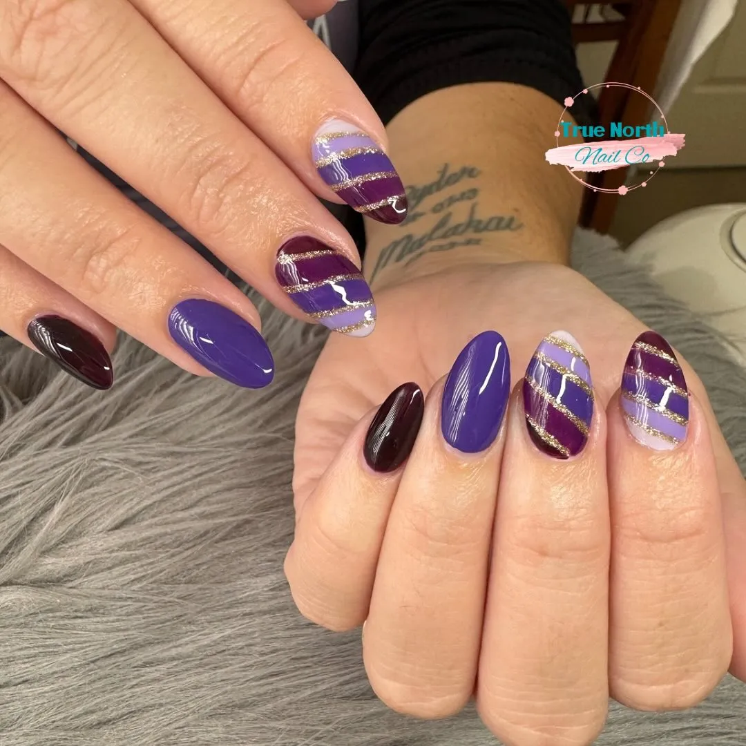 Plum and purple diagonals with gold glitter striping