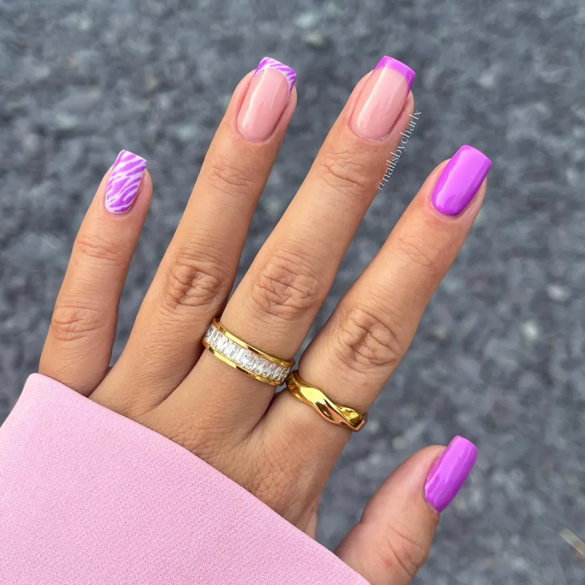 Bright purple tips with stripe accent and solid purple nails