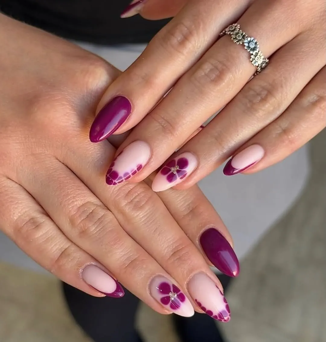 Plum French tips with a floral accent