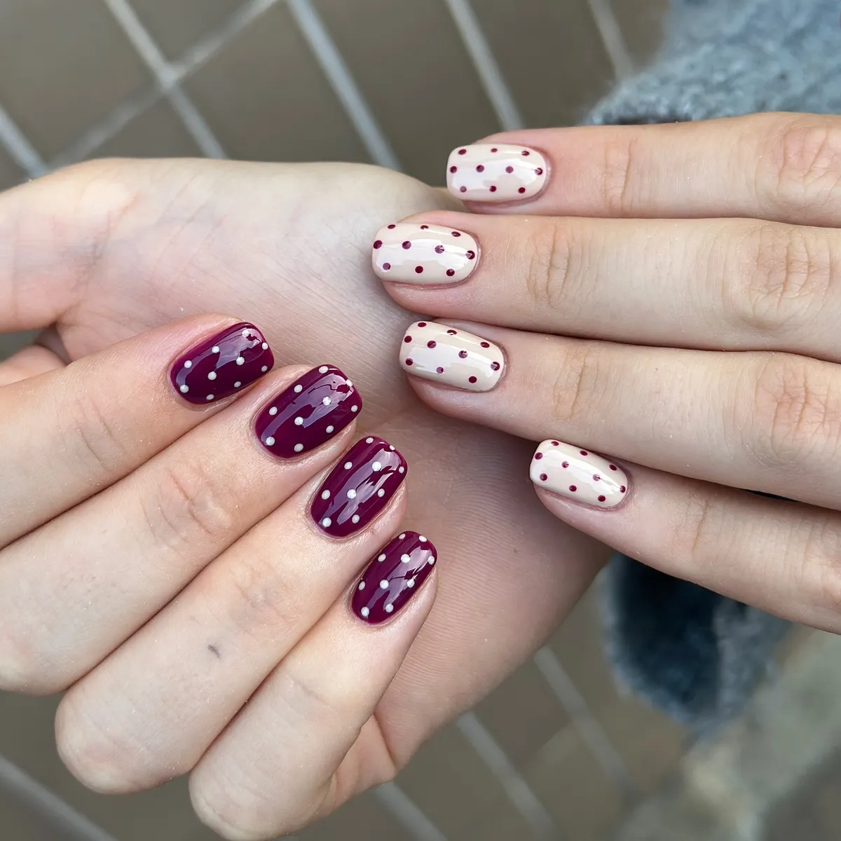 Plum drips and polka dots paired with nude dots