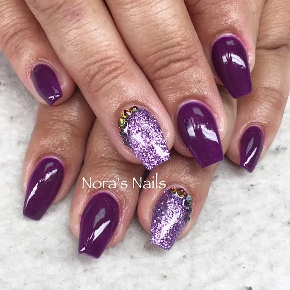Deep plum gloss with light-purple glitter accents