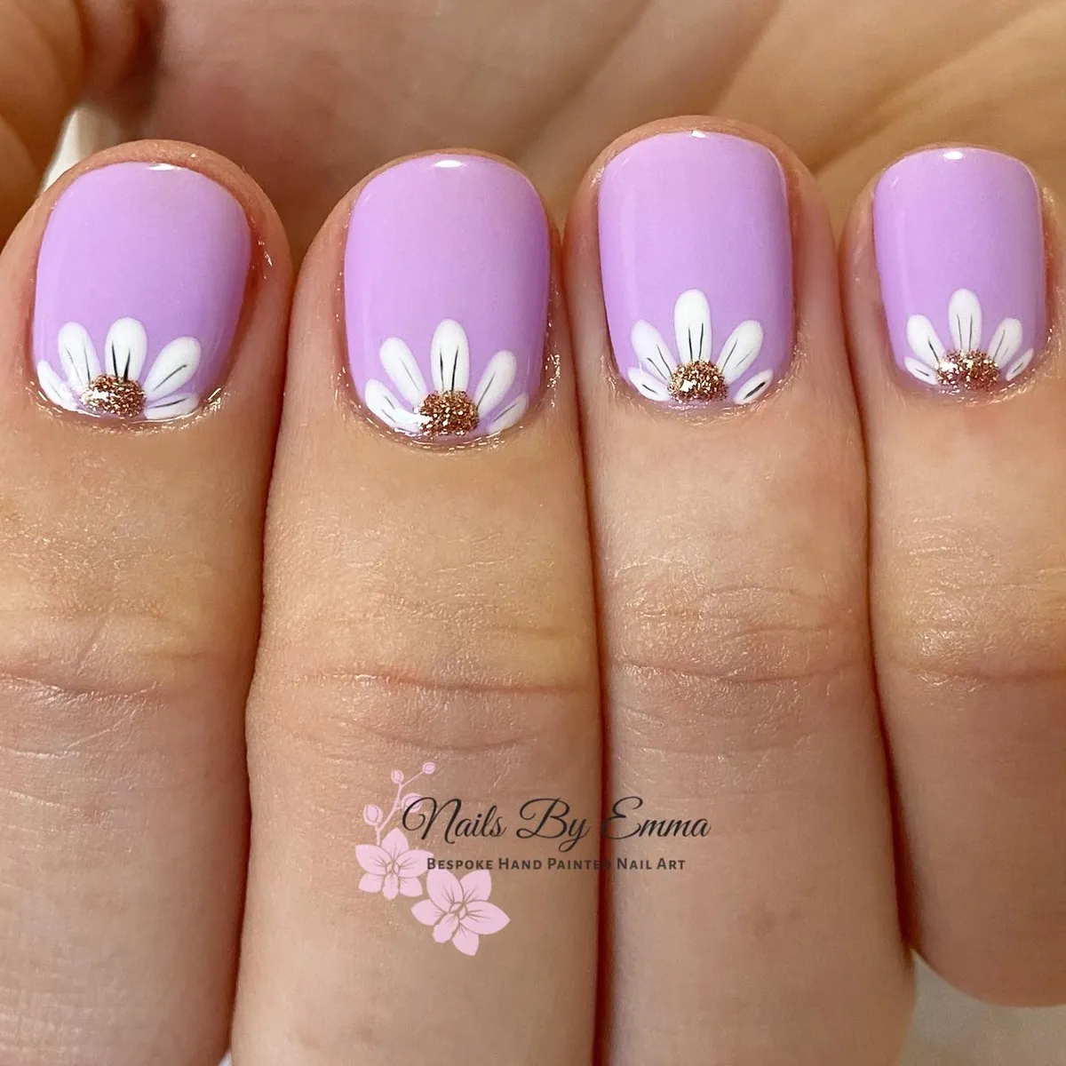 Light lilac nails with white daisy cuticle accents