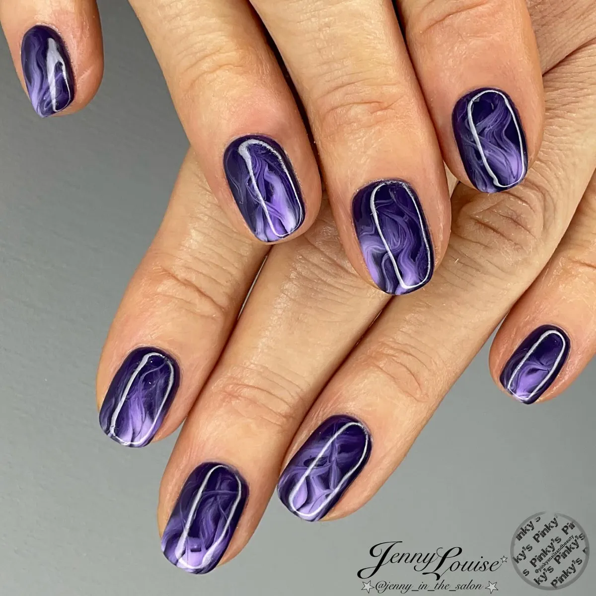 Dark purple marble with thin white line accents