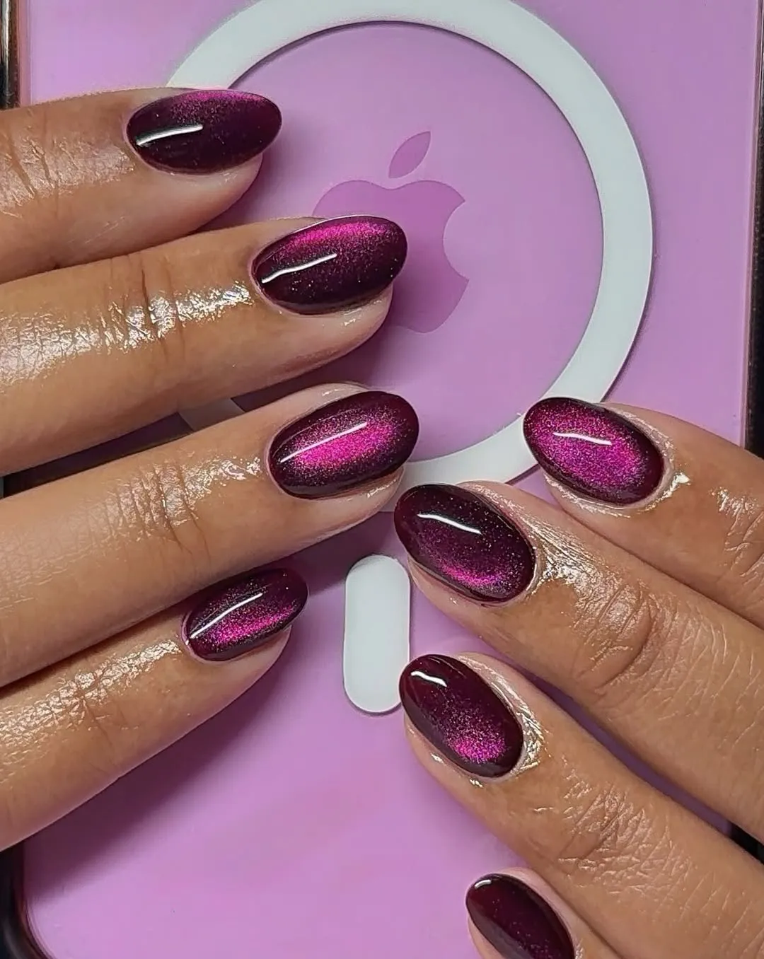 Wine-plum nails with magenta reflective stripe