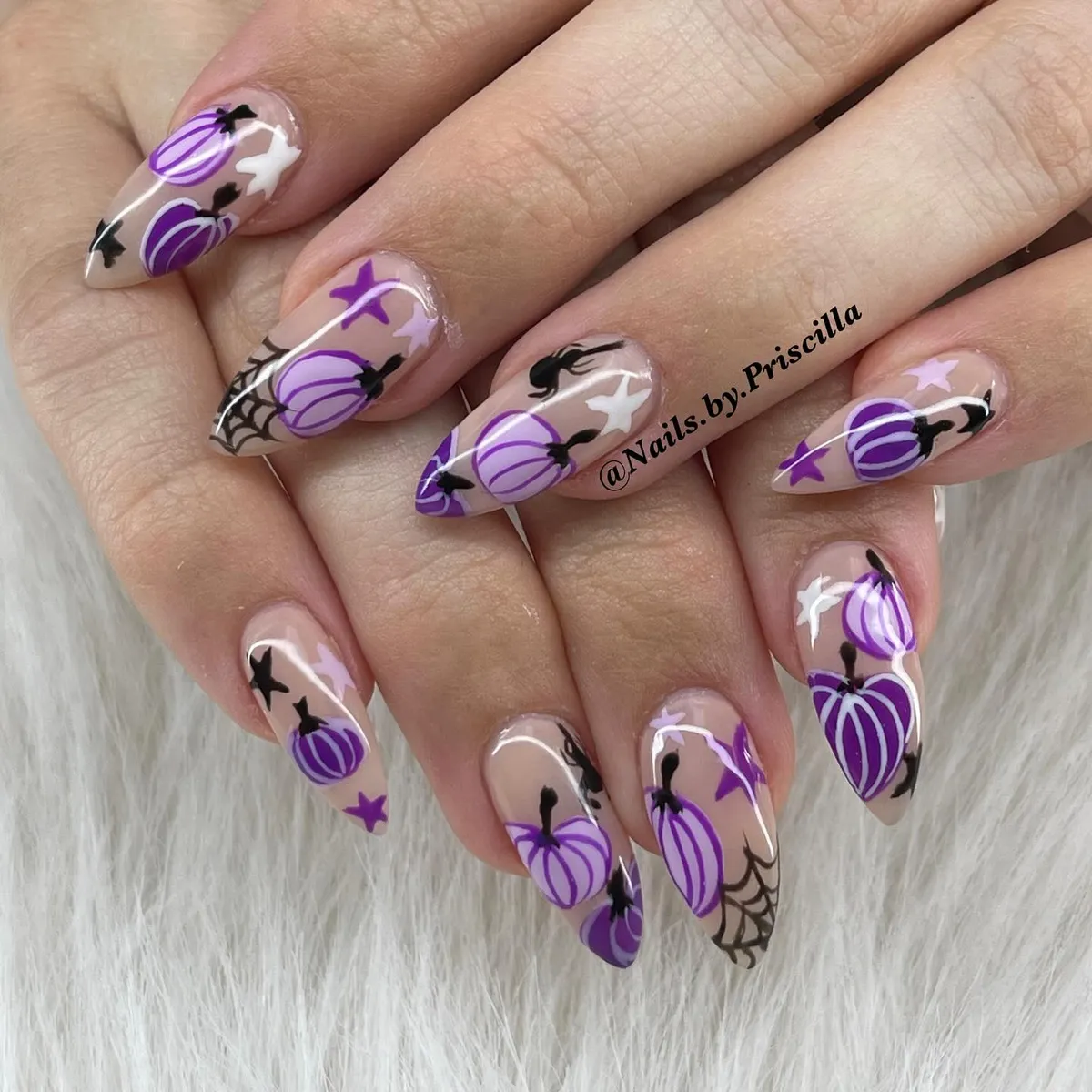 Nude base with purple pumpkins, bats, and webs