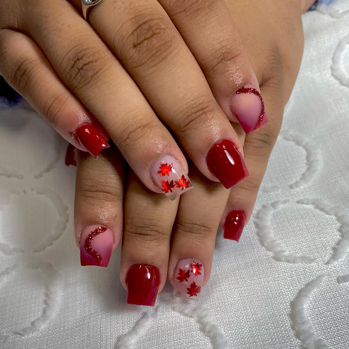 Glossy red with translucent leaf accents