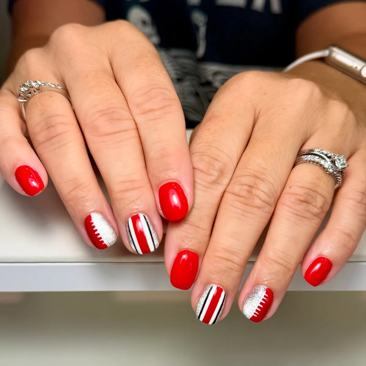 Glossy red with silver glitter football-lace accents