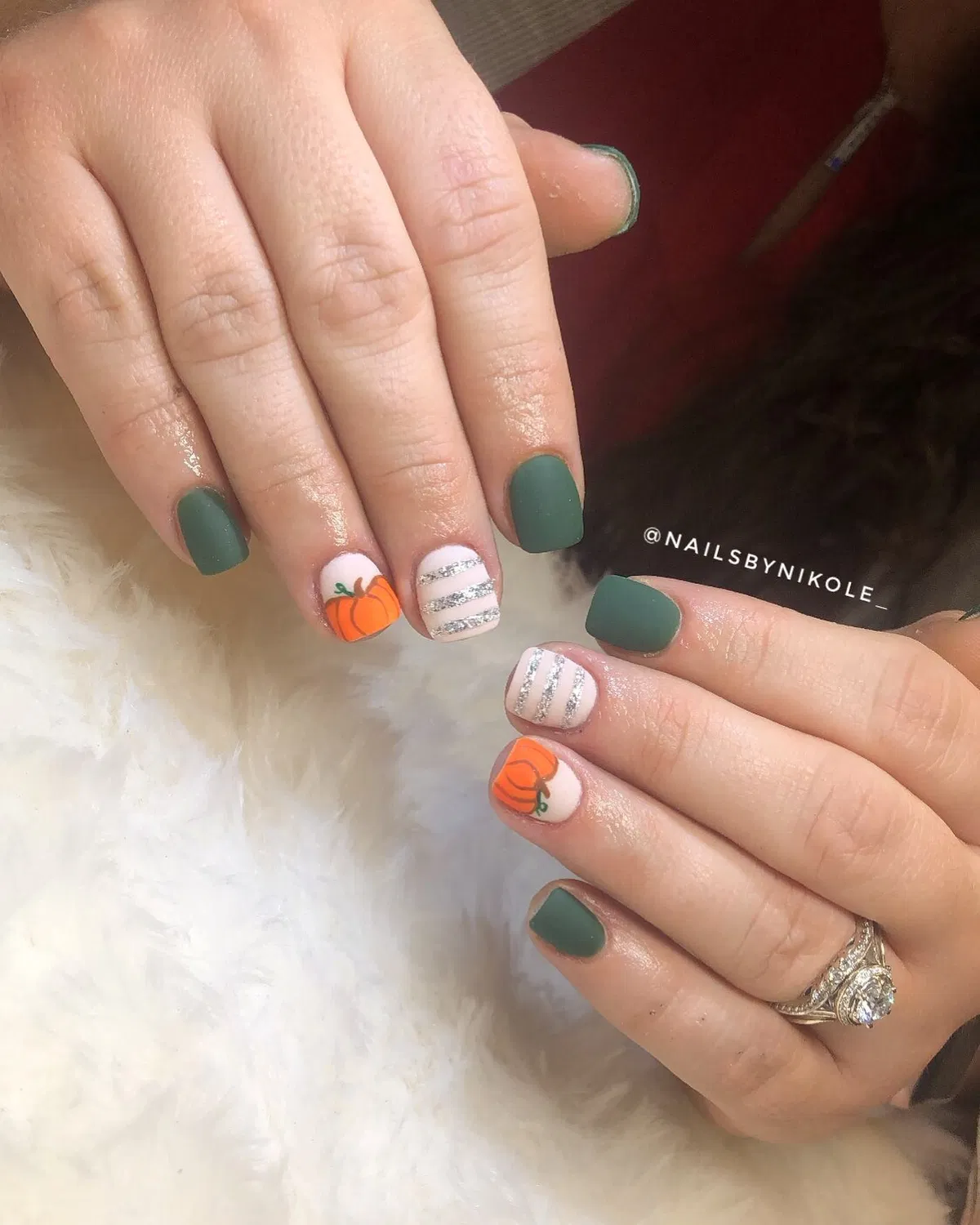 Matte dark green with pumpkin and silver-striped accents