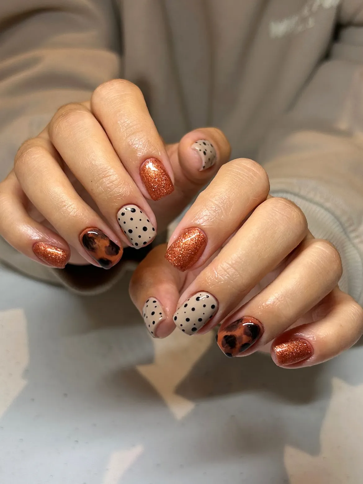 Copper glitter with polka dots and mottled accent
