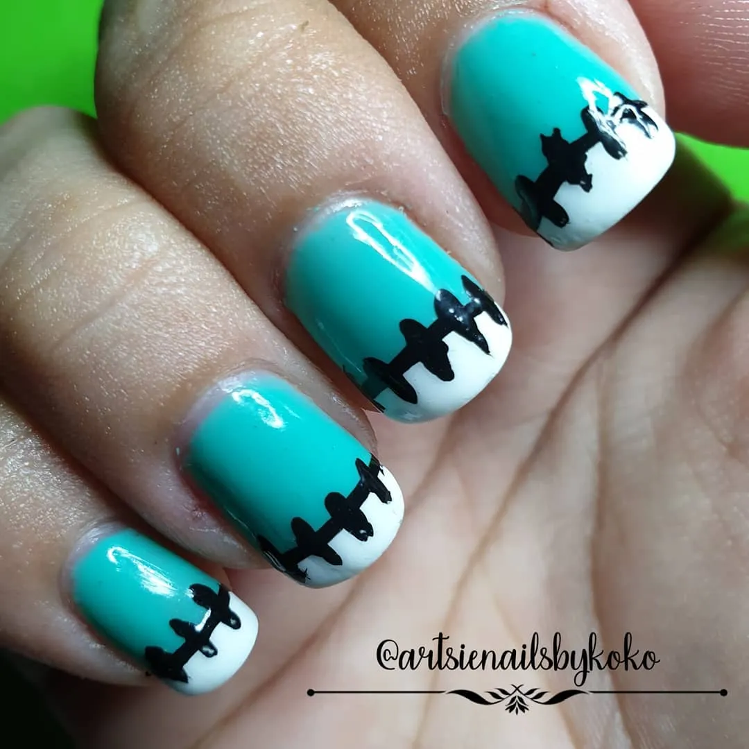 Teal French tips with stitches