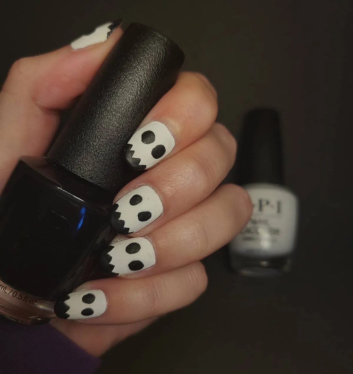 White nails with jagged-edge ghosts