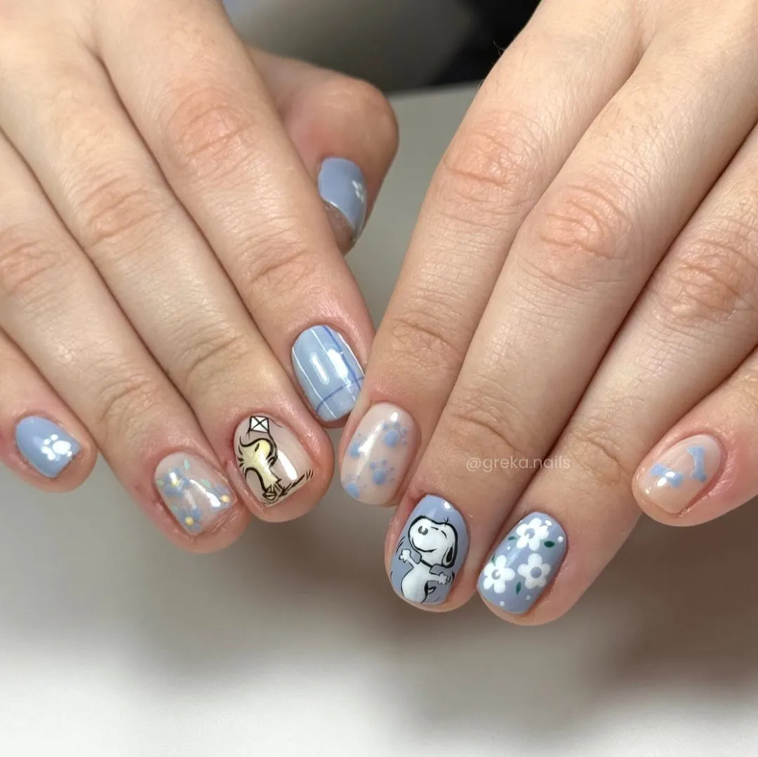Light blue plaid and floral accents with cartoon details