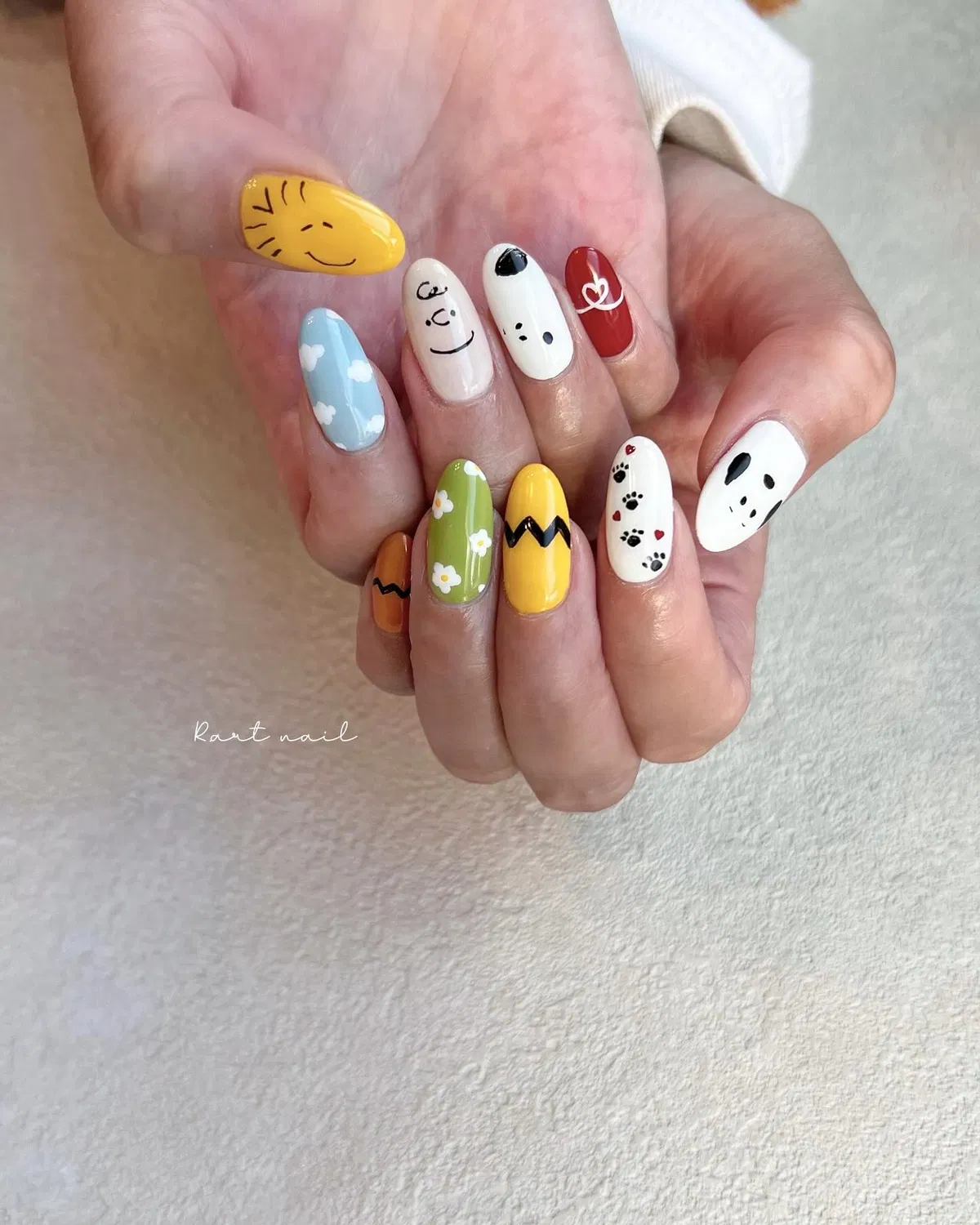 Mixed bright set with clouds, zigzags, paw prints, and face details