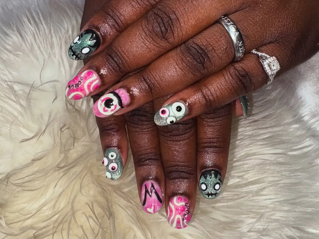 Spirals and eyeball motifs in pink and gray