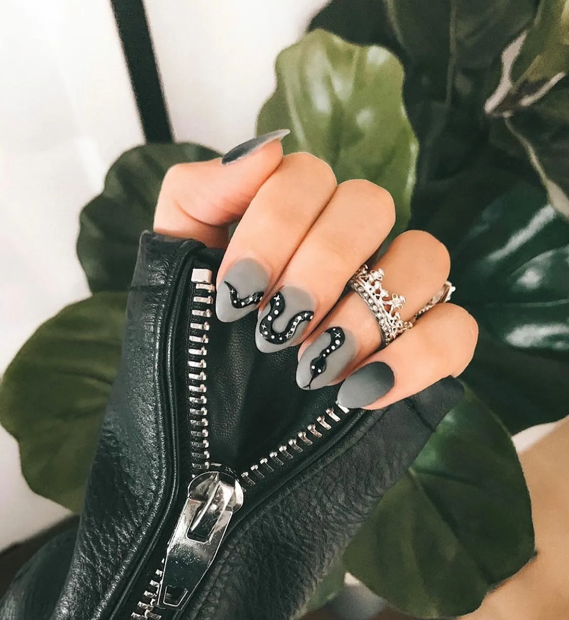 Matte gray nails with black snake designs