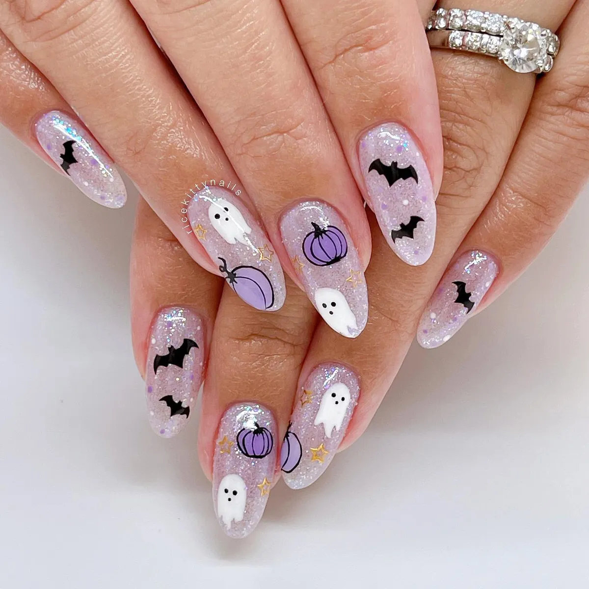 Glitter lavender ghosts, bats, and pumpkins