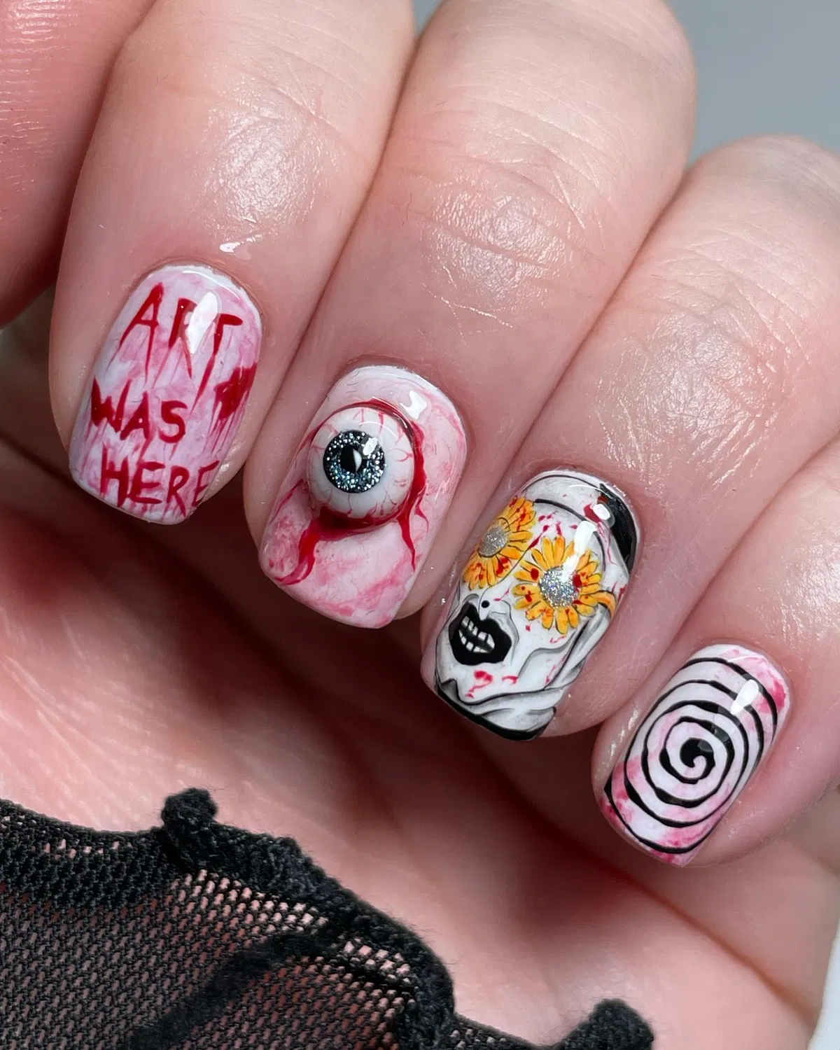 Mixed horror set with text, eyeball, face, and spiral