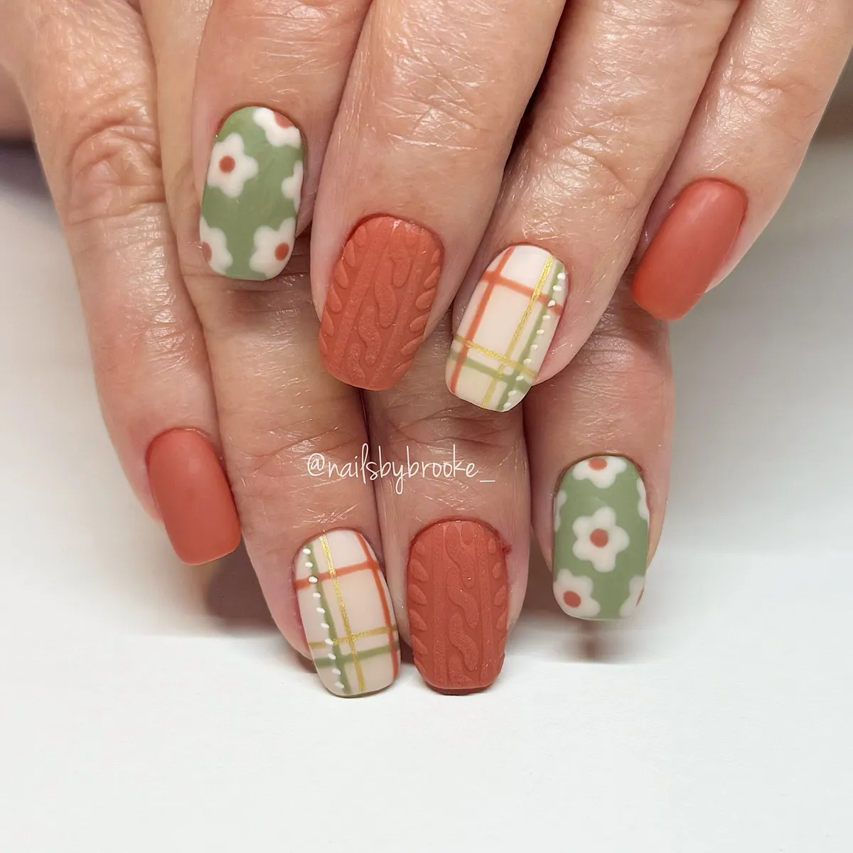 Olive florals, plaid accents, and rust texture