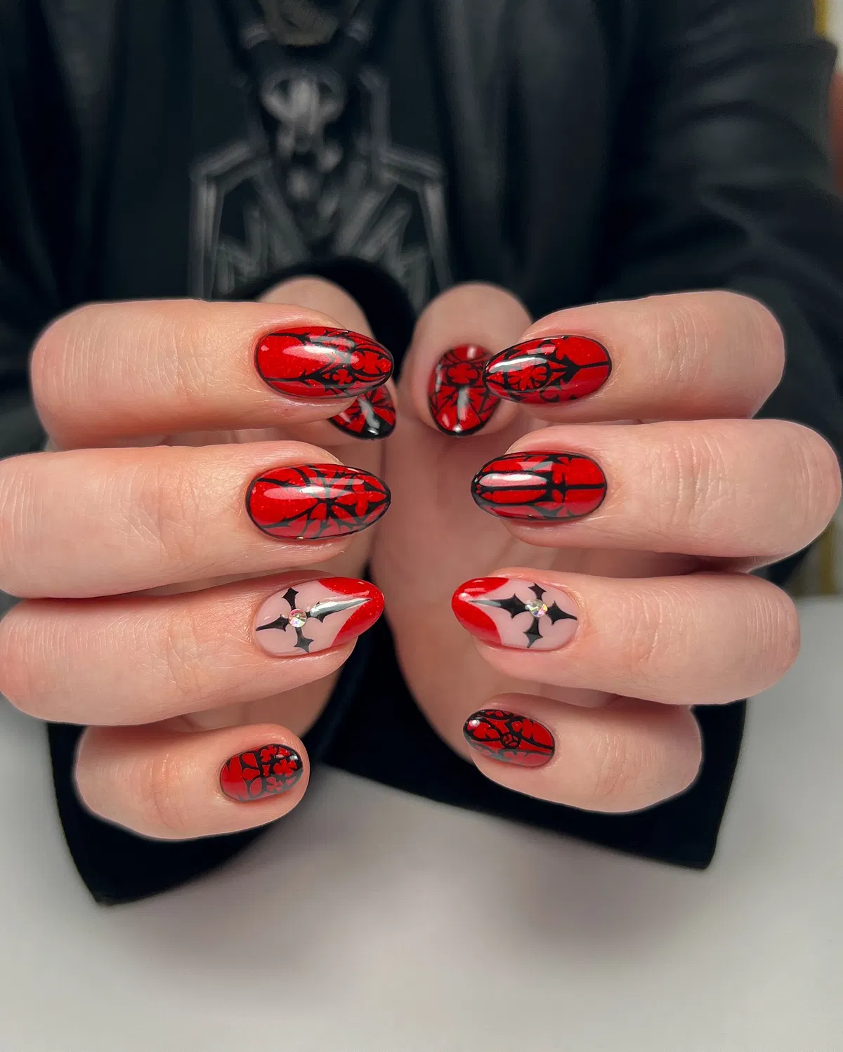 Matching red ornamental set with bat-and-rhinestone accents