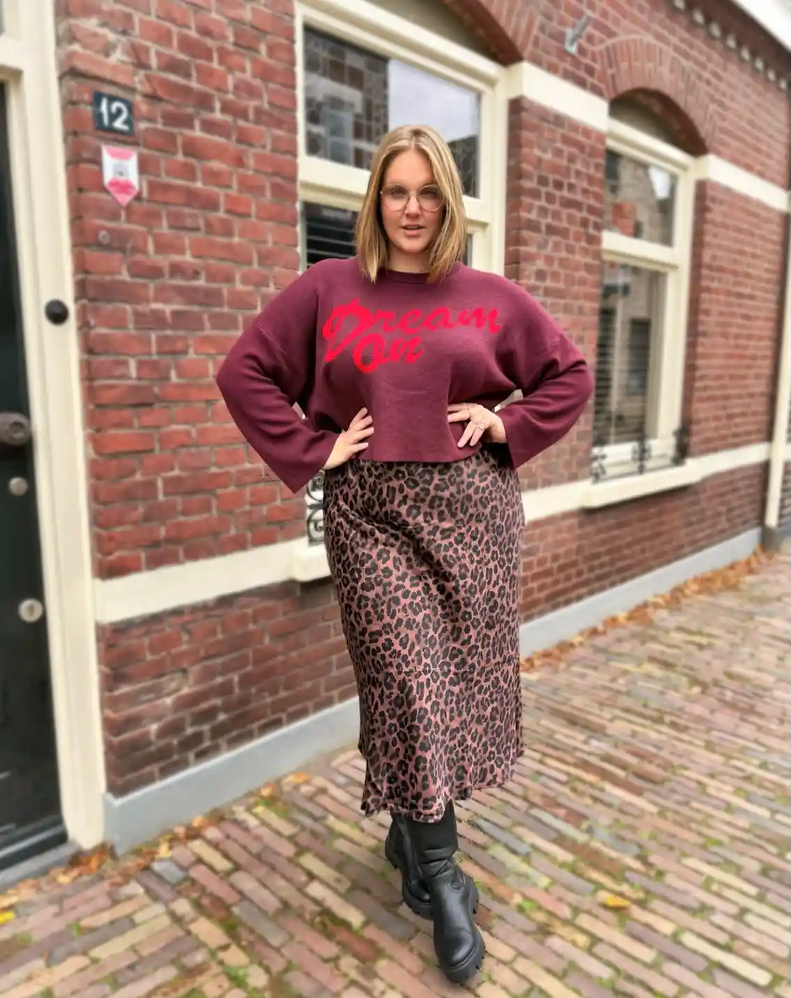 Graphic sweatshirt with leopard midi skirt