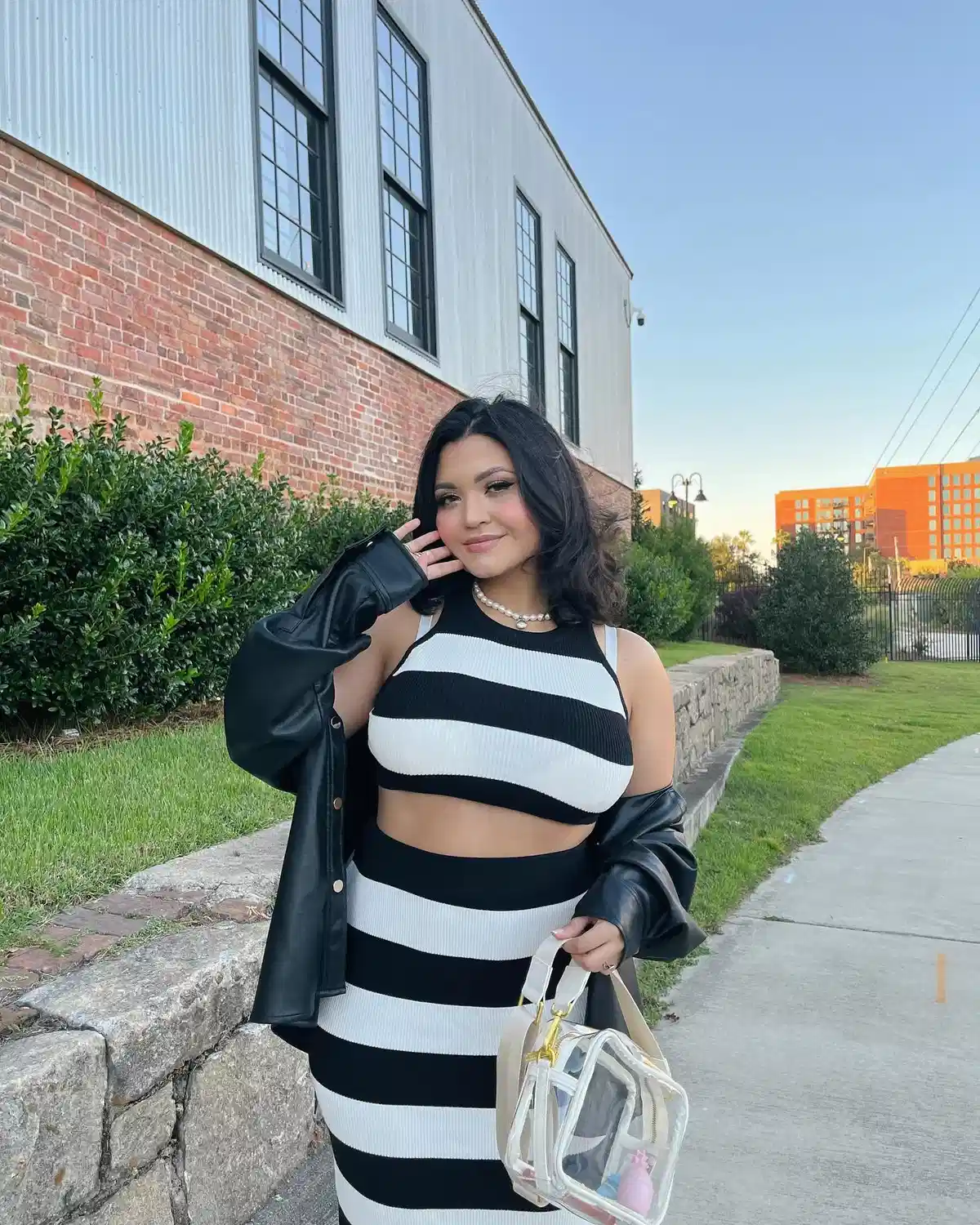 Black-and-white stripes with an off-shoulder jacket