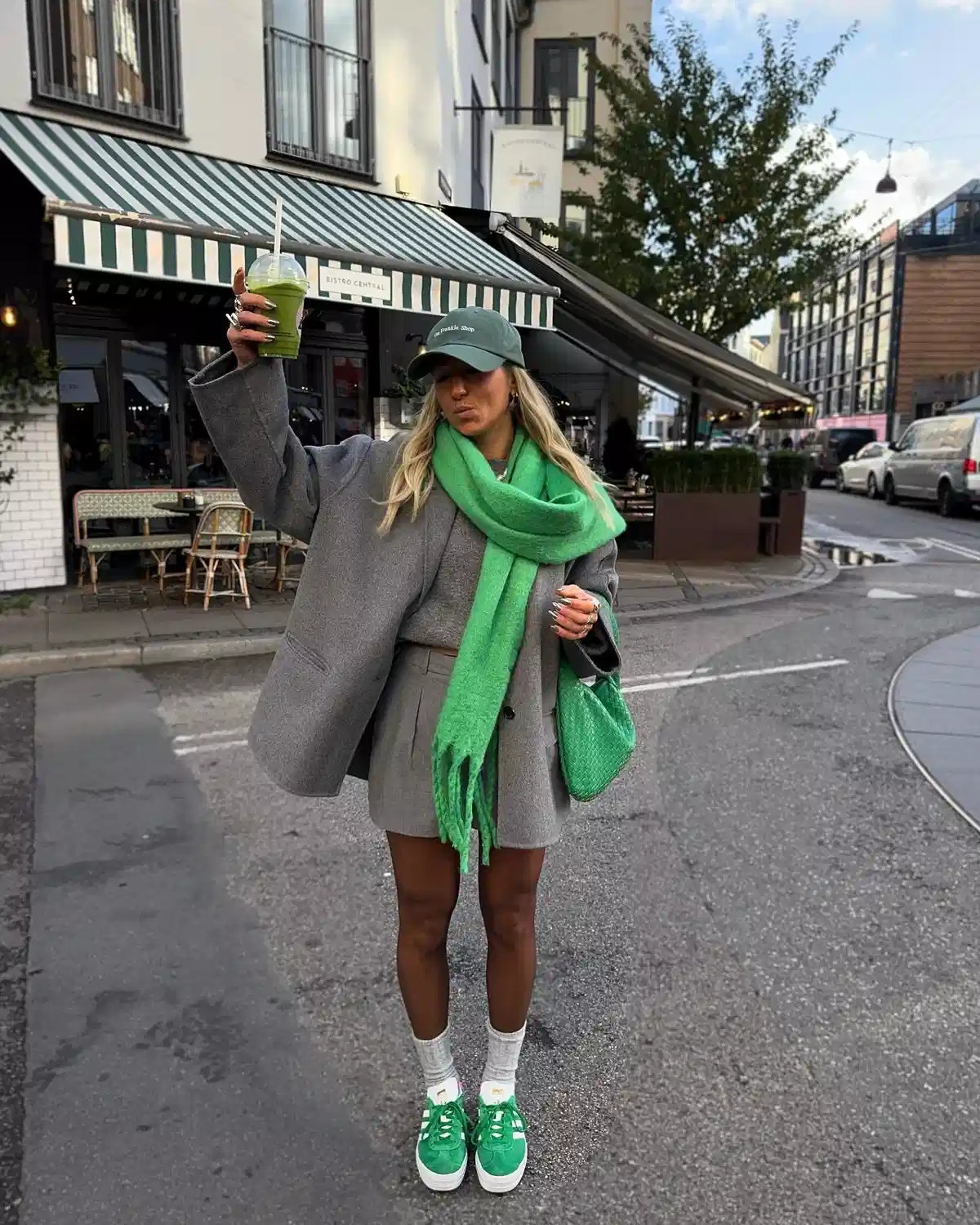 Monochrome gray set with bright green scarf and sneakers