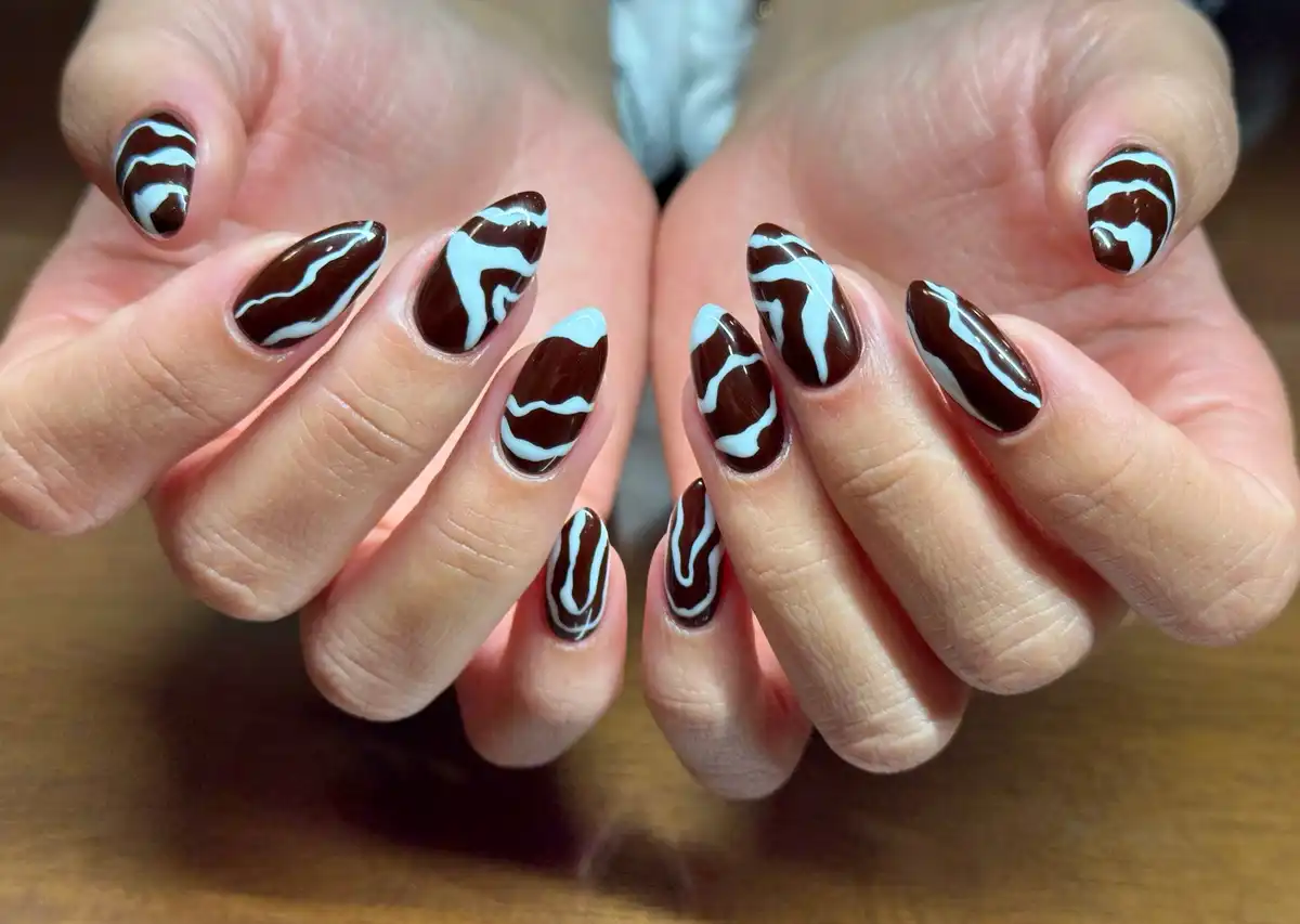 Dark brown base with light-blue wavy lines