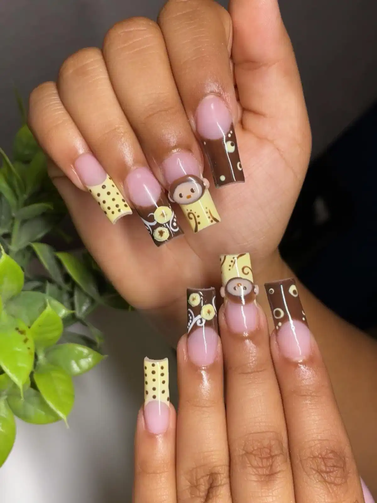 Nude base with brown-and-yellow patterned tips and a 3D bear accent