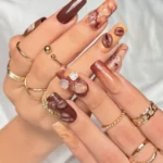 🍫 17 Brown Acrylic Nails You’ll Want to Save for Your Next Gorgeous Manicure Fashion image by @neha_nail_aura