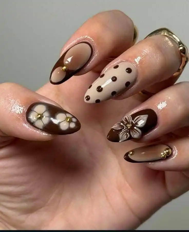 Brown floral and polka-dot almond nails