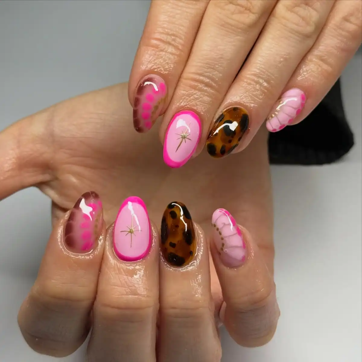 Hot-pink outlines with tortoiseshell-style brown accents