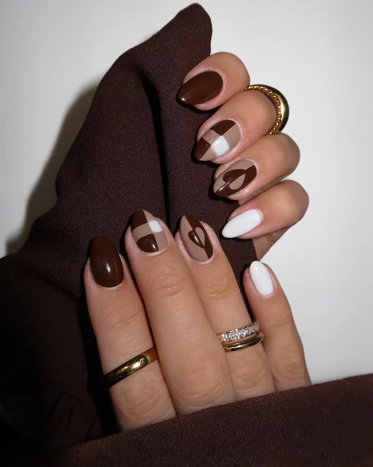 Geometric brown color-blocking with a heart outline accent