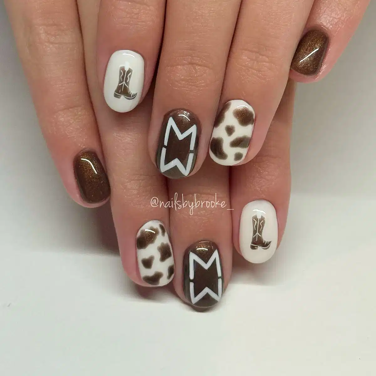 Metallic brown and white set with boots, spots, and star outline