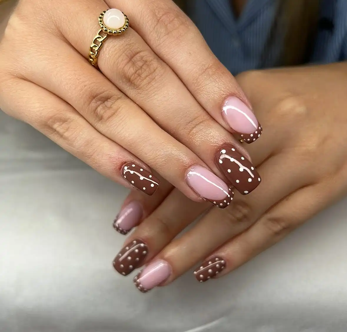 Square nude-and-brown set with dotted French tips and white line accents