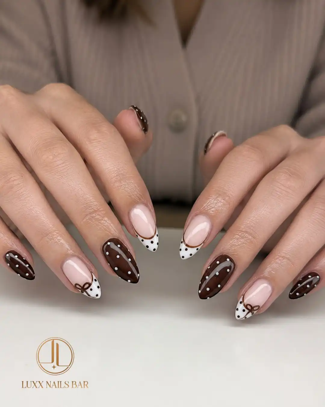 Polka-dot French tips and dotted dark brown accent nails