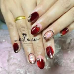 ๐น 18 Maroon Cat Eye Nails That Make Rich Maroon Shades Look Seriously Stunning Fashion image by @feby_nailart