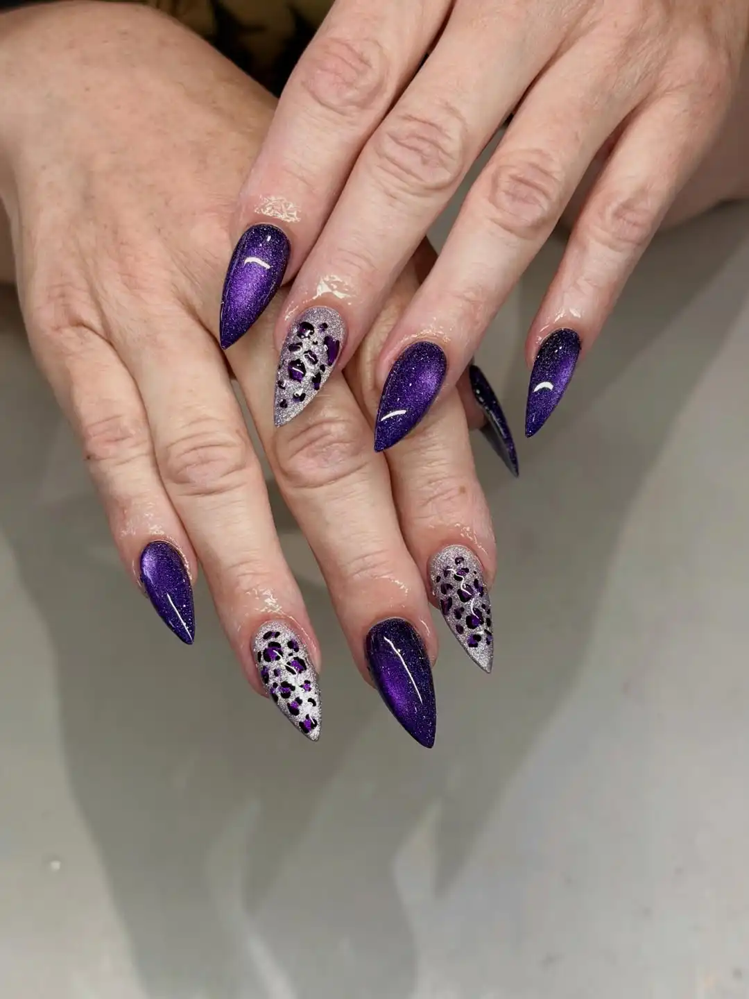 Sparkly deep purple stilettos with spotted glitter accents