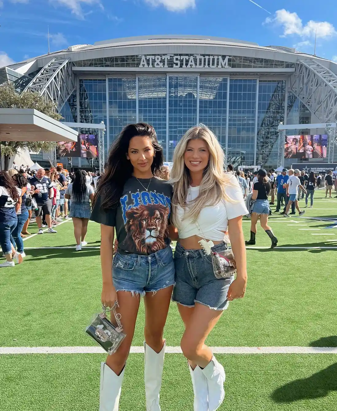 Denim shorts with graphic tee/crop top and matching white boots