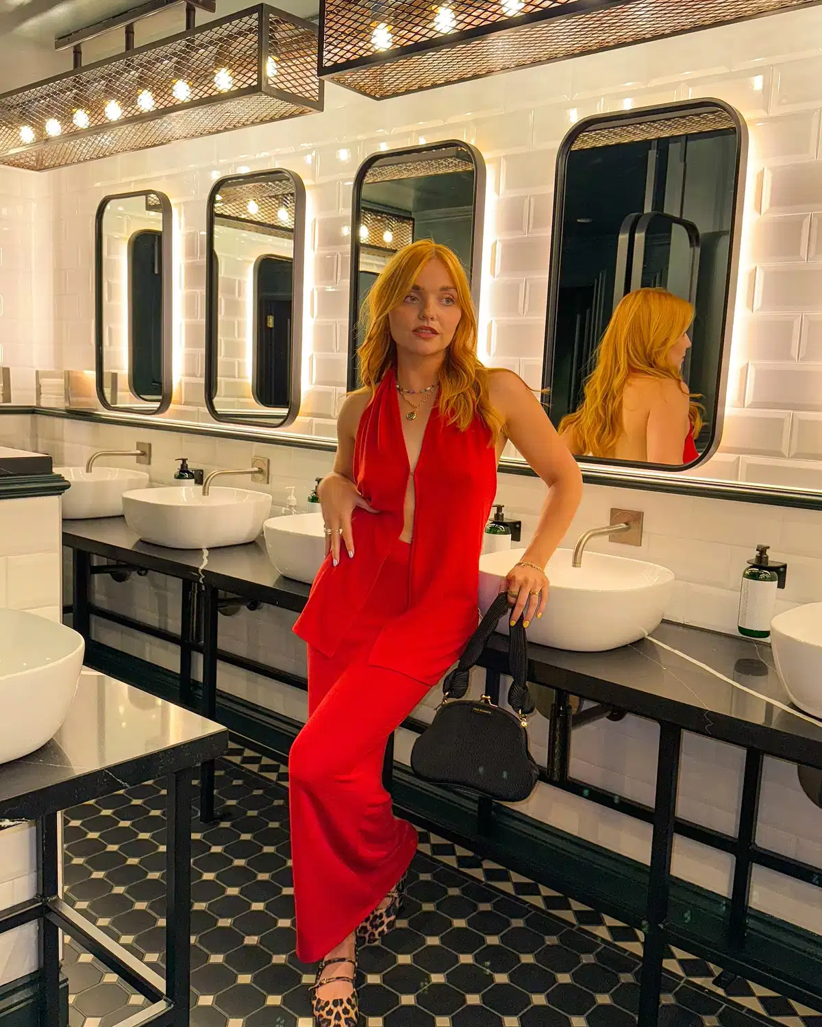 Red sleeveless wide-leg set with leopard heels