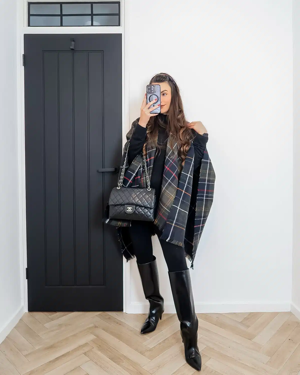 Black base layers with plaid wrap and knee-high boots