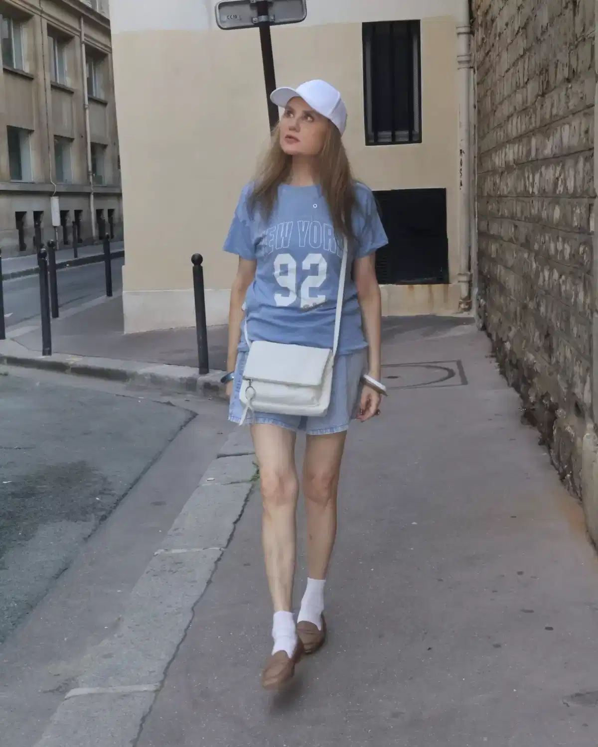 Graphic “NEW YORK 92” tee with denim mini skirt