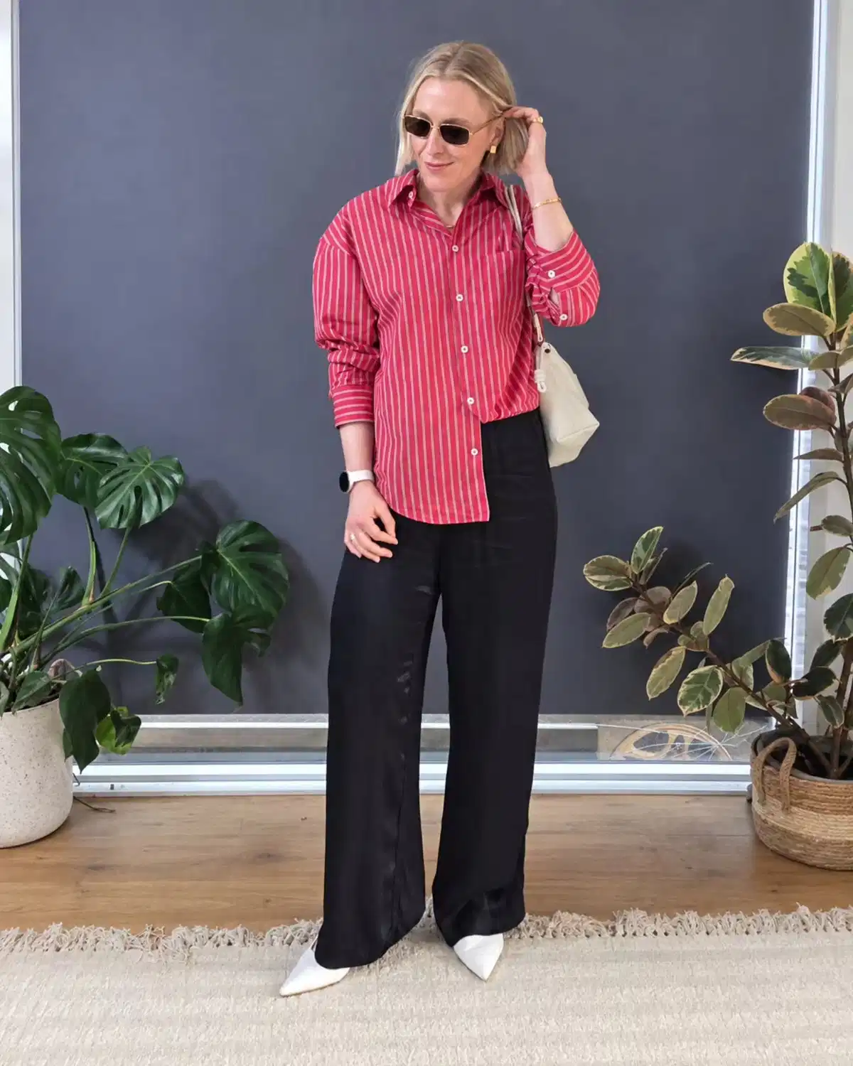 Red striped shirt with black wide-leg pants
