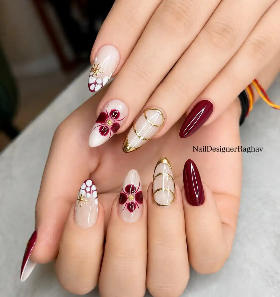 Maroon solids with floral accents and gold detailing
