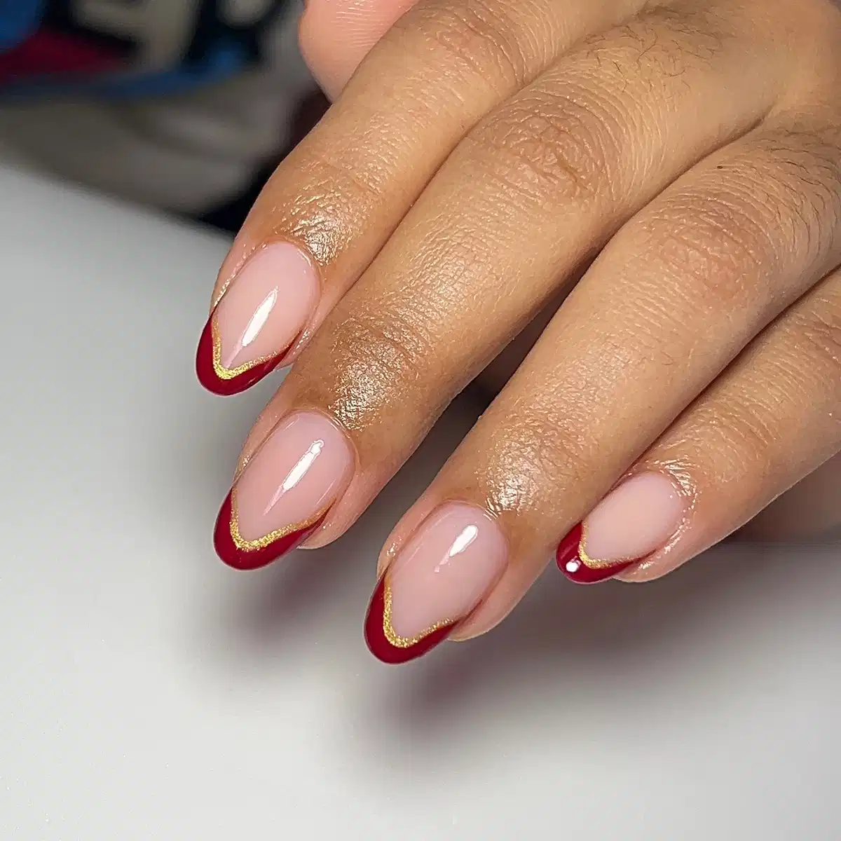 Maroon Tips with Gold Glitter Outline