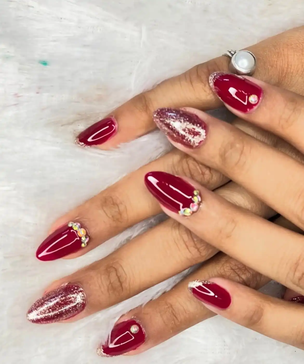 Maroon Almonds with Glitter Accent Nails and Rhinestones