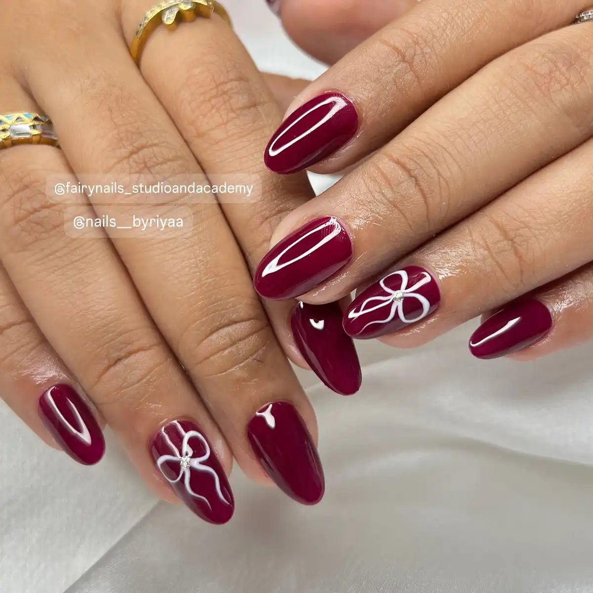 Glossy maroon with white outline flowers and crystal centers
