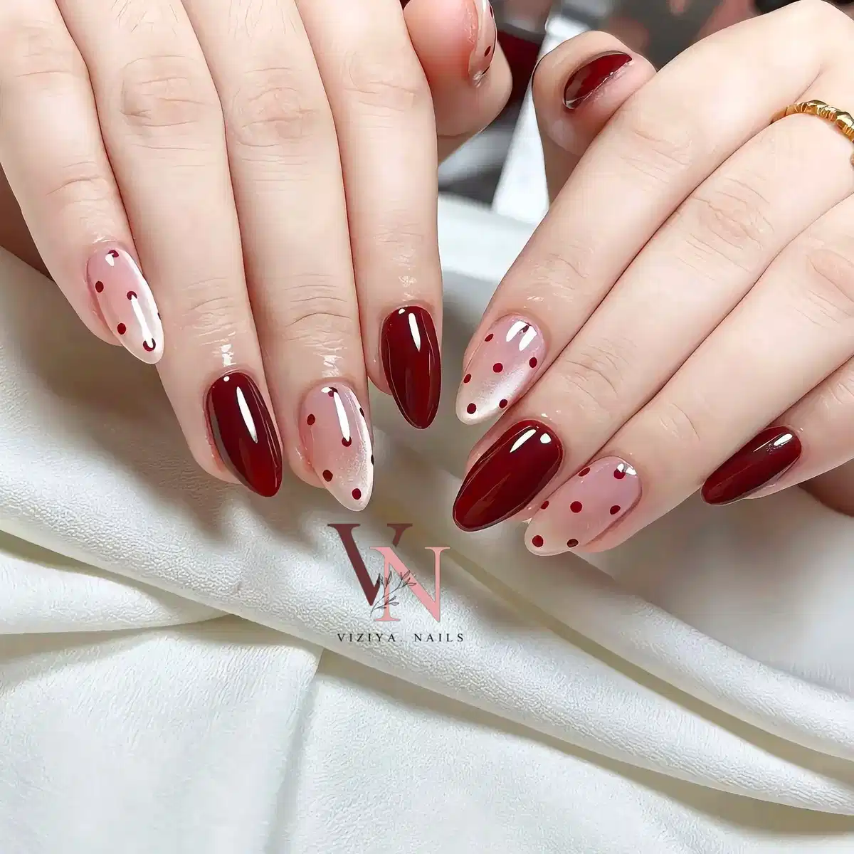 Glossy maroon solids paired with nude maroon polka dots