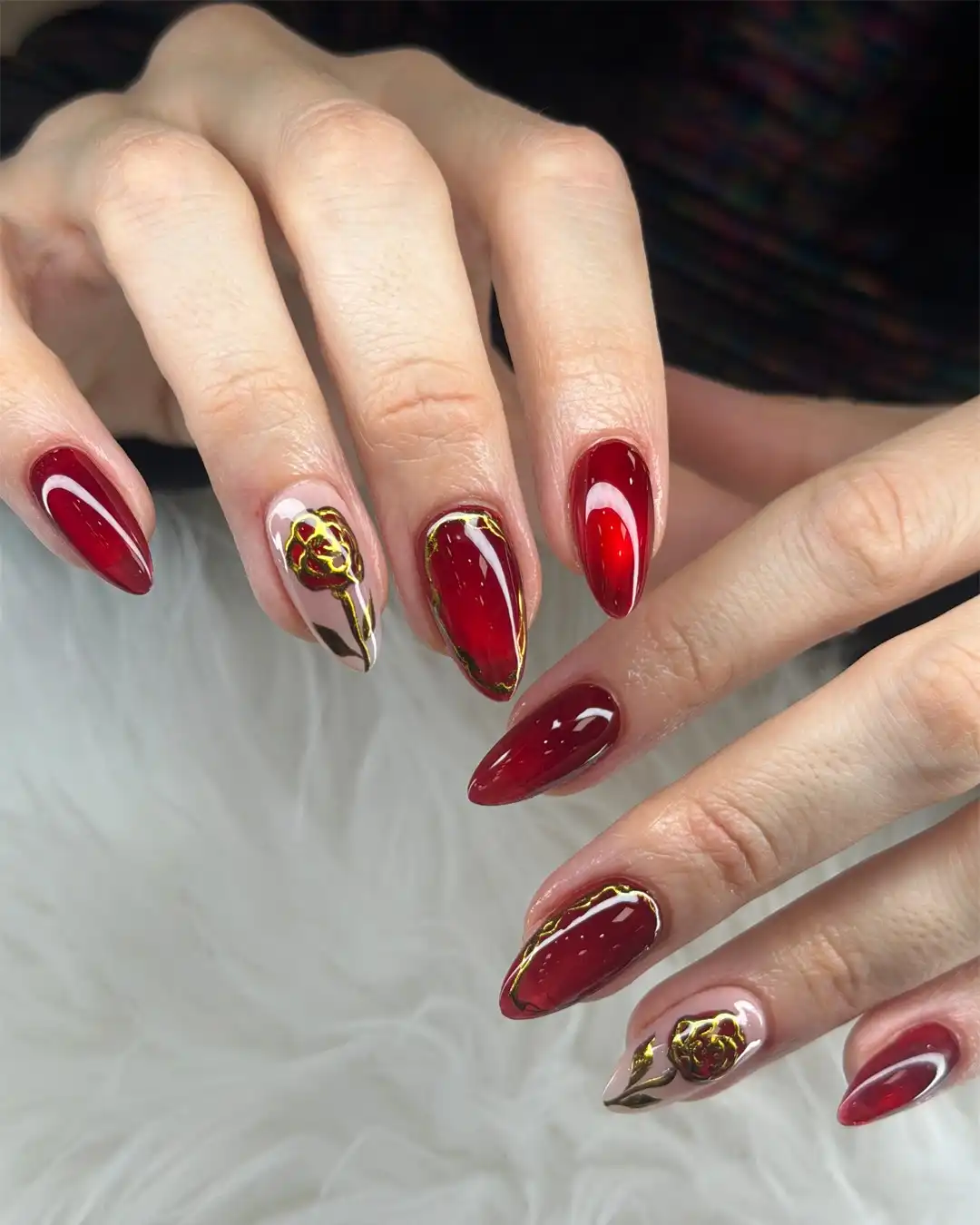 Maroon-red mix with nude nails and gold floral outline art