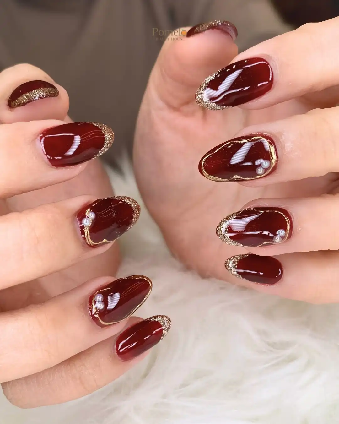 Maroon with Gold Glitter French Tips and Pearl-Like Bead Accents